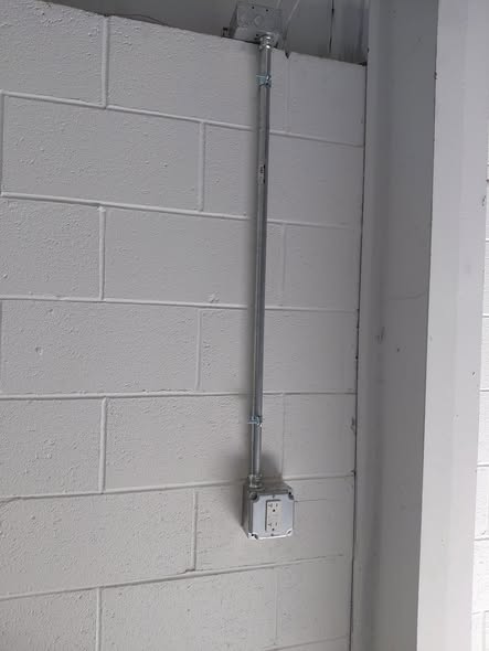 Newly installed receptacles and conduit in a commercial space