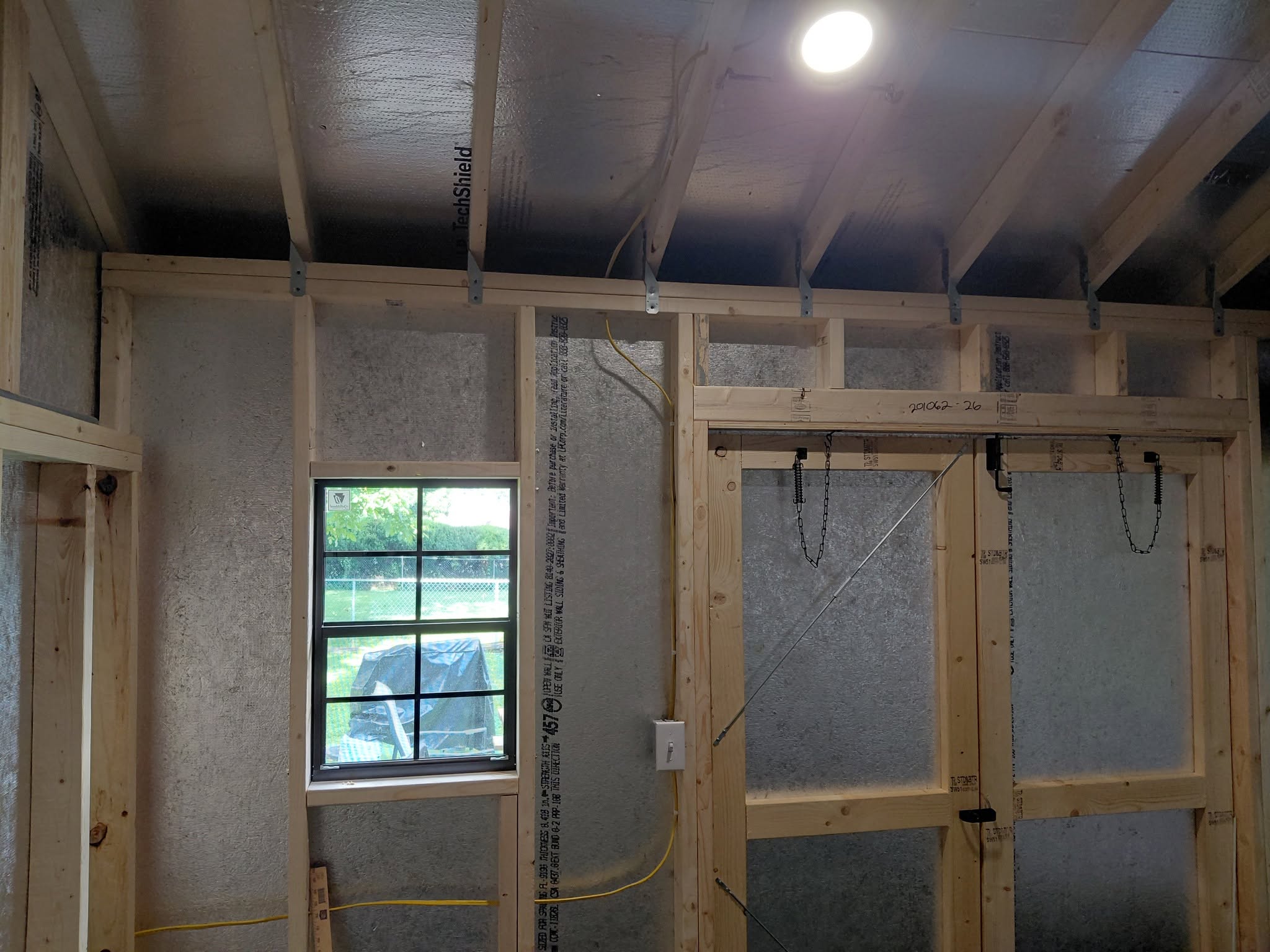 Interior electrical wiring and lighting installed in a shed