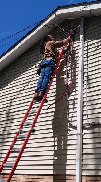 Residential electrical service equipment on the exterior of a home